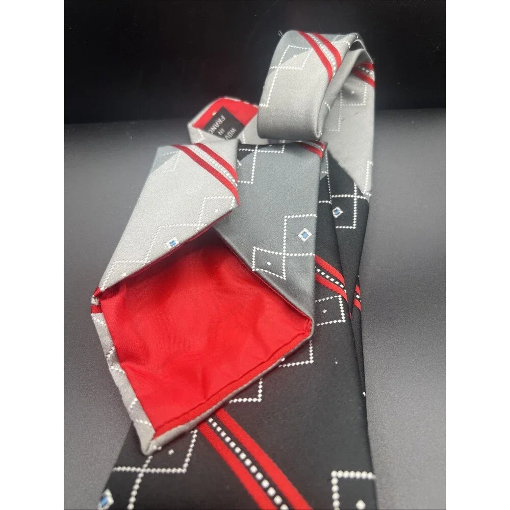Wembley Geometric necktie. Woven. France. Gray, Black,Red, Blue
